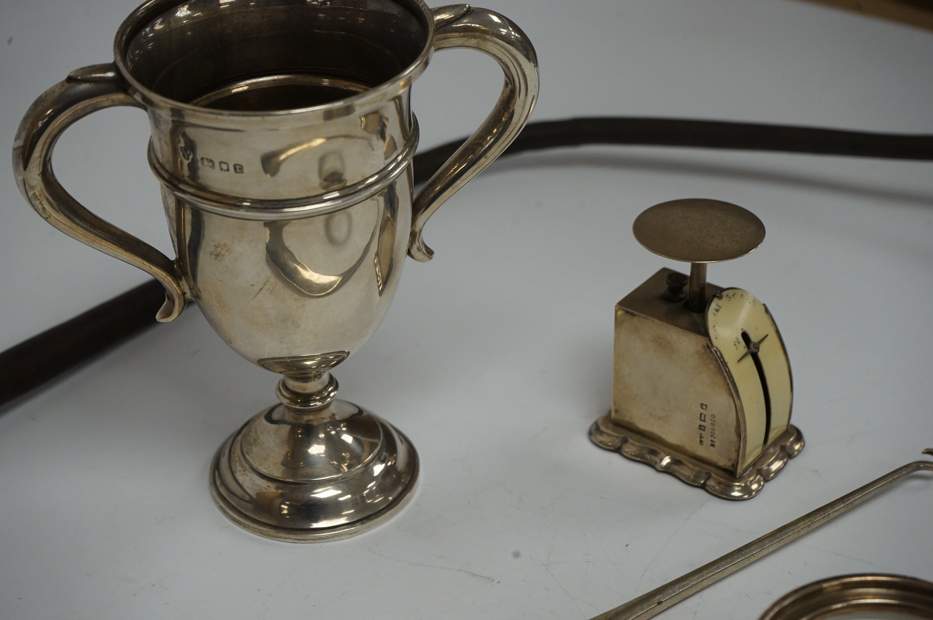 A small George V silver two handled presentation replica trophy cup, with engraved inscription relating to the 1933 Monte Carlo Rally, Charles Boyton & Sons, London, 1932, 14.2cm, together with an early 20th century silv